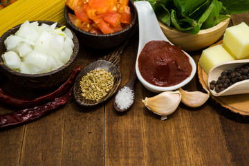 Raw spaghetti Ingredients on wooden table