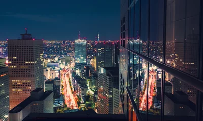 Wall murals City building Aerial view cityscape at night in Tokyo, Japan from a skyscraper