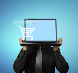 man showing  laptop against