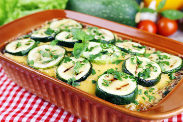 Casserole with vegetable mallow on table, closeup