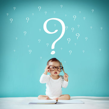 Little baby and blackboard with "Question Mark" on background, S