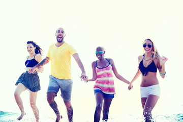 Obraz premium Diverse Beach Summer Friends Holding Hands Concept