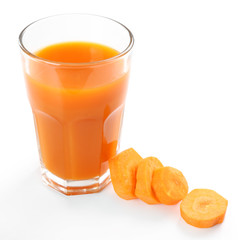 Glass of carrot juice with vegetable slices isolated on white
