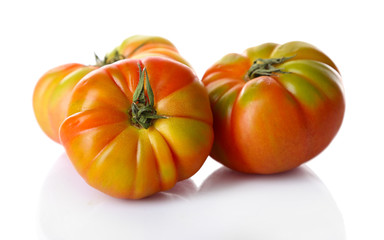 Fototapeta na wymiar Green tomatoes isolated on white
