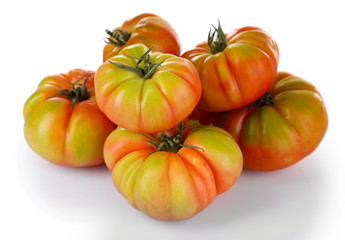 Green tomatoes isolated on white