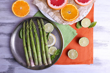 Fresh asparagus on pan, close-up