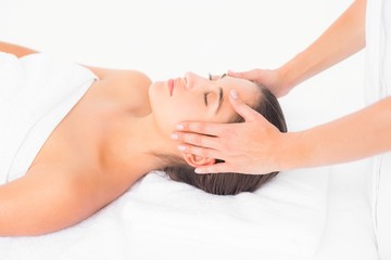 Fototapeta na wymiar Attractive woman getting massage on her back