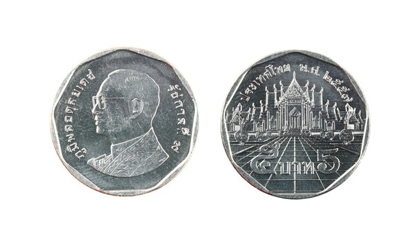 Five Baht Thailand coins isolated on white background.