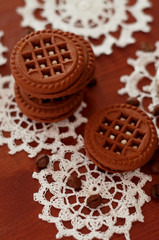 Chocolate cookies with sweet cream and coffee beans
