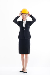 ヘルメットを被っているスーツの日本人女性,全身