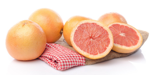Naklejka na ściany i meble Fresh grapefruits on burlap