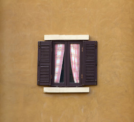 Fototapeta na wymiar Window on cement wall