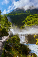 Fototapeta premium Waterfall near Briksdal glacier - Norway