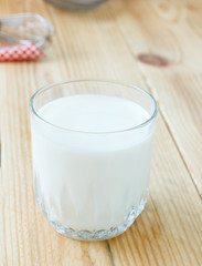 Breakfast with milk on wooden table