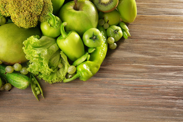 Fresh green food on wooden background