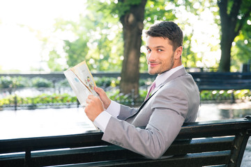 Fototapeta premium Businessman holding newspaper