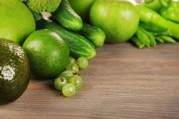 Fresh green food on wooden background