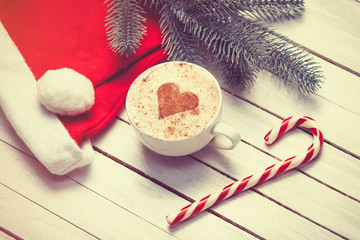 Cup of coffee and christmas candy