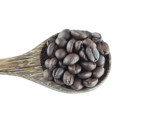 Coffee beans in wooden spoon isolated on white.