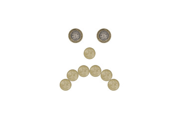miserable face made out of one pound coins