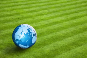 Foto op Plexiglas Map of the globe on a blue leather football © jasoncoxphotography