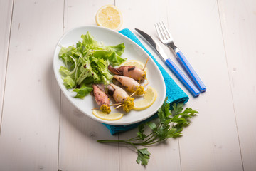 filled squid with salad