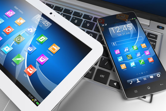Mobile devices. Tablet PC, smartphone on laptop, technology conc