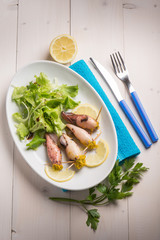 filled squid with salad