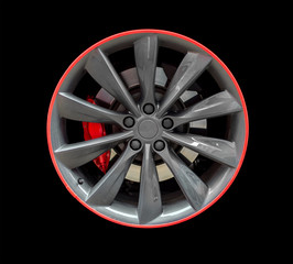 Sports car rim isolated on black background.