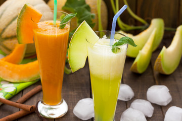Melon juice with melon slices and ice