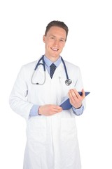 Fototapeta premium Smiling doctor holding a digital tablet