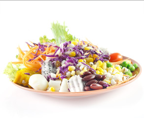 Closeup of mixed salad on white background