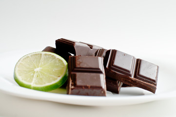square of black chocolate and lime