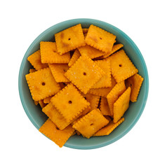 Bowl filled with small cheese crackers.