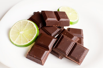 square of black chocolate and lime
