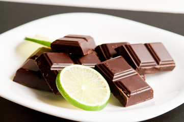 square of black chocolate and lime