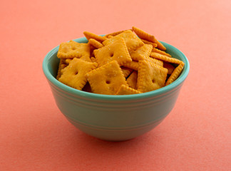 Small bowl filled with cheese crackers