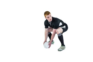 Rugby player about to throw a rugby ball