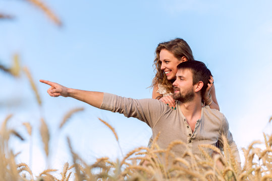 Young Couple in Wheat Field