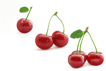 juicy cherries isolated on white
