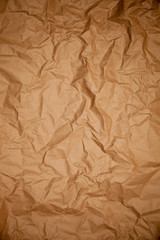 Crumpled dark wrapping paper texture