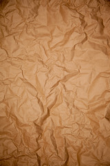 Crumpled dark wrapping paper texture