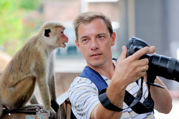 Photographer shows a monkey