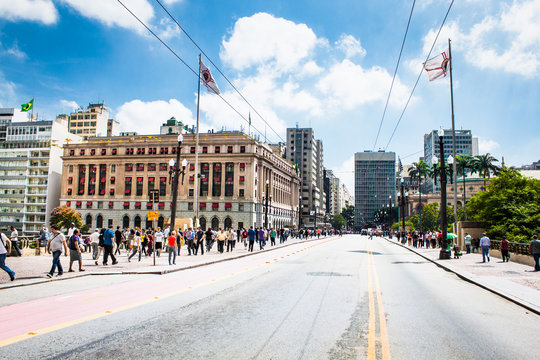People walk in Santa Ifigenia viaduct in Sao Paulo, Brazil.