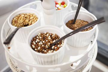 Chocolate sprinkles/Chocolate sprinkles use as a decoration or to add texture to desserts. Decorative element for cakes. Very shallow depth of field for soft background