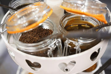 Chocolate sprinkles/Chocolate sprinkles use as a decoration or to add texture to desserts. Decorative element for cakes. Very shallow depth of field for soft background