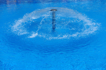 Swimming pool with fountain