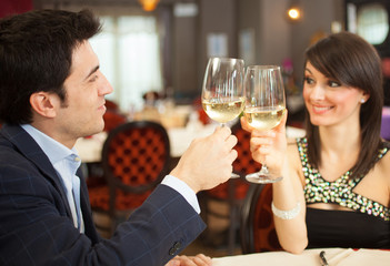 Couple toasting wineglasses