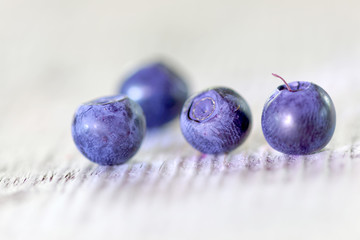 Four blueberries, short DOF