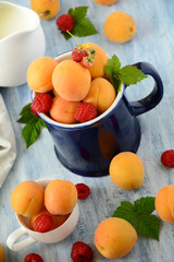 Raspberries and apricots